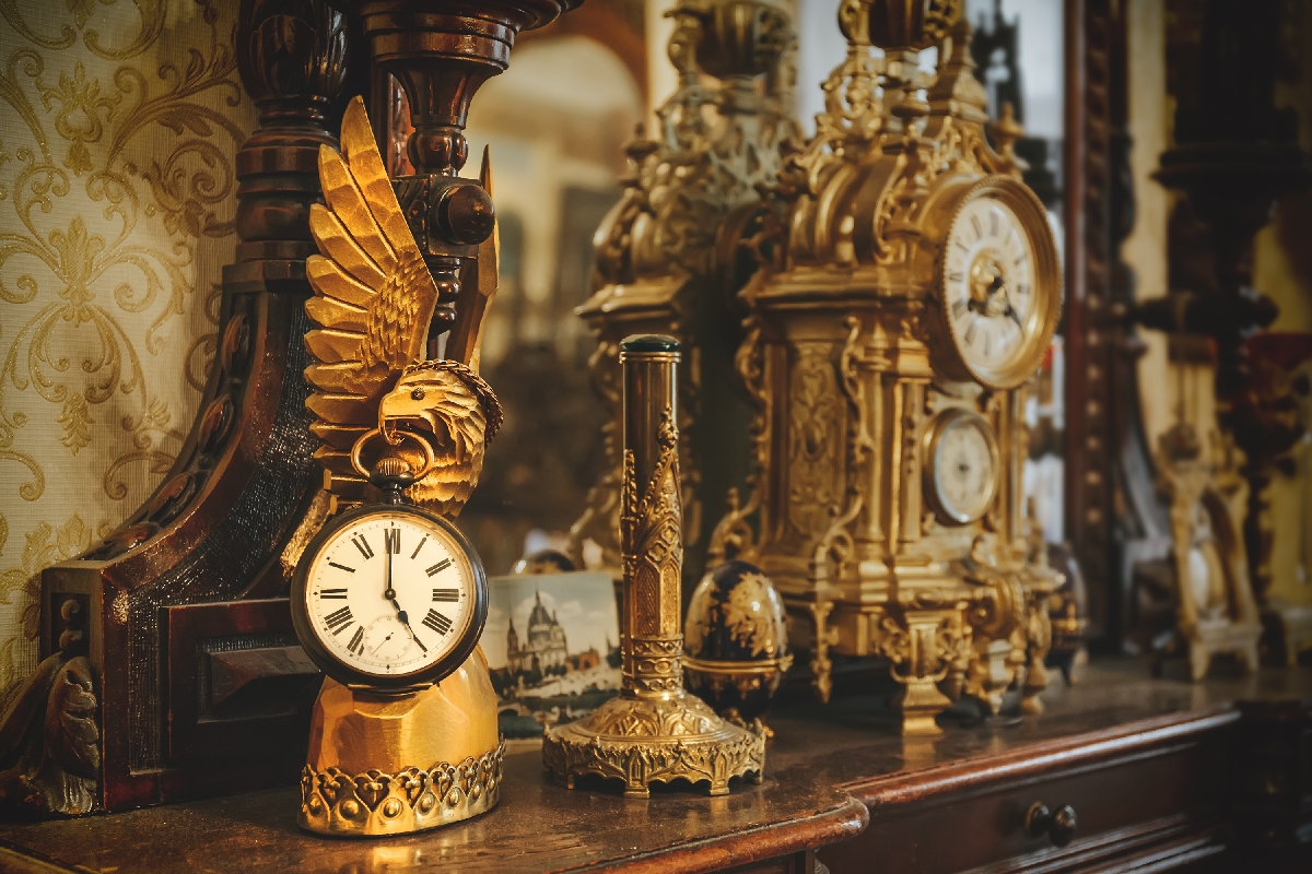 Old,Vintage,Antique,Bronze,Clock,And,Utensil,On,Wooden,Shelf,